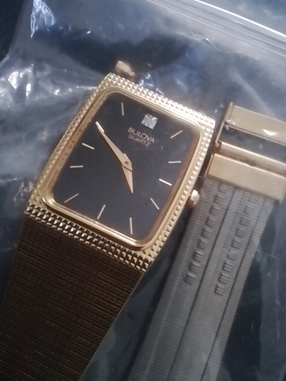 Bulova Gold-Tone Rectangular Watch with Black Dial